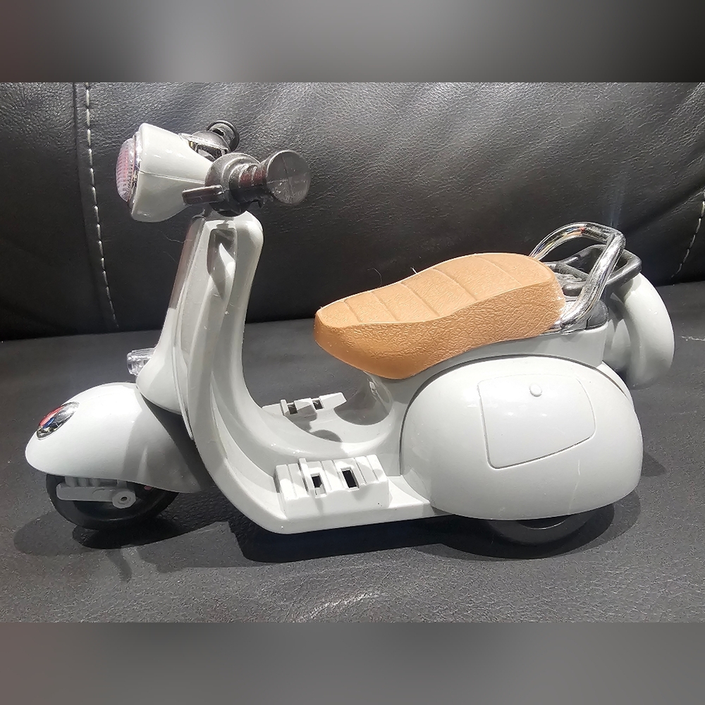 Gray and Tan Toy Scooter